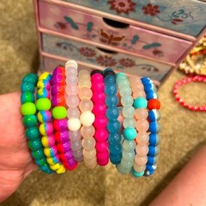 10 bubble bracelets. Only worn a couple of times and in good condition.